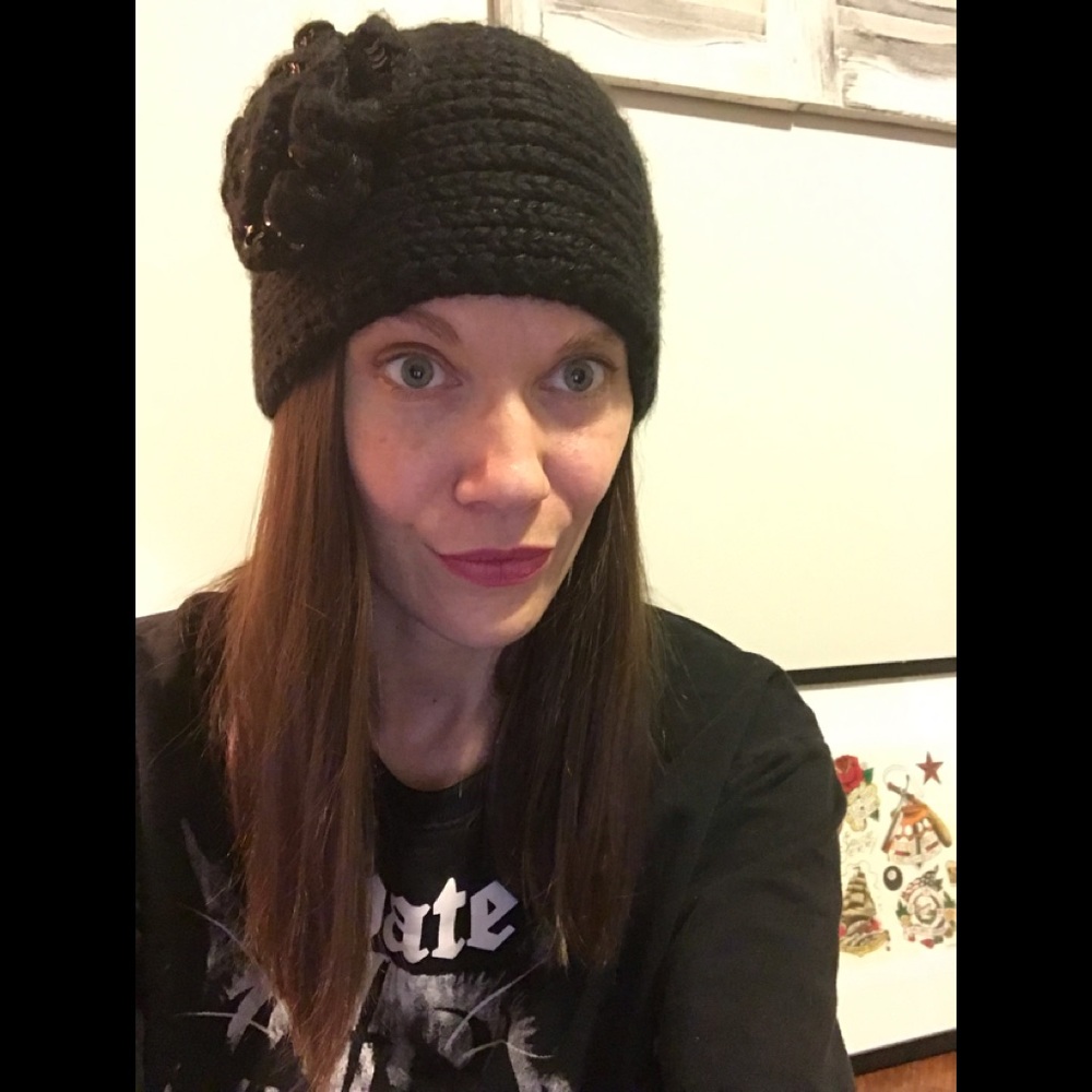 Claire’s Sequin Flower Ear Warmer